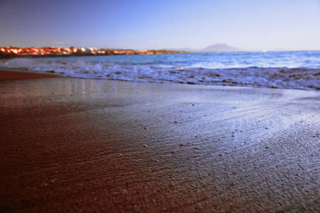 Wave On Sandy Beach. Background. Splash of waves on the sandy beach. foam, surf, waves.の写真素材
