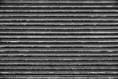 Old Roll-up Garage Gate. Old rusty garage doors.の写真素材