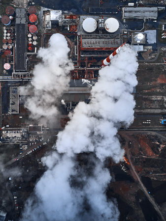 Smoking pipes of thermal power plant. Aerial view. Pipes of thermal power plant. heating of the city. heating season.の写真素材
