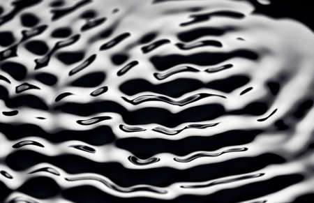 Movement of water - Abstract Black Background Liquid Texture. liquid abstraction.の写真素材