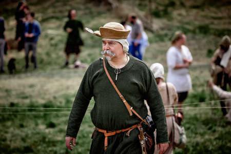 Man in the hat. old man with a beard. historical reconstruction, the peasant of the middle ages. Medieval battle (reconstruction) Czech Republic, Libusin, 04/25/2015のeditorial素材