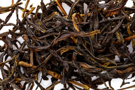pile of raw chinese tea isolated on white.