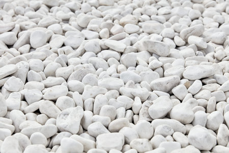 White pebbles stone background. Relaxation, meditation and calmness around us.