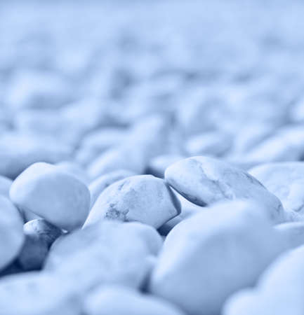Blue pebbles stone background. Relaxation, meditation and calmness around us.の写真素材