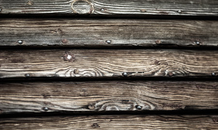 Old wooden wall. Detail of wooden planks.