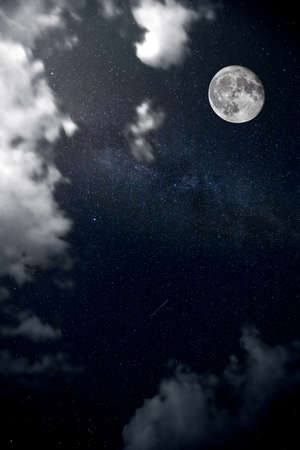 Night sky, clouds, moon and stars Abstract backgroundの写真素材
