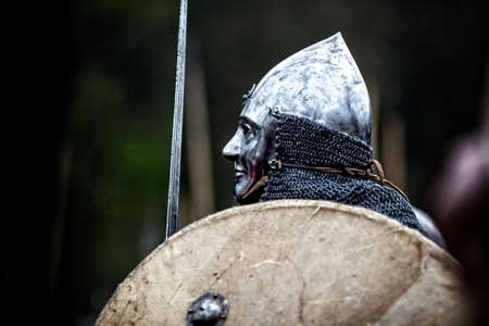 Powerful heavy fighter with sword and helmet.の写真素材