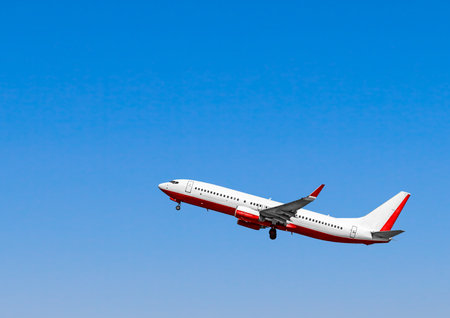 Plane at takeoff, the plane in the blue skyの写真素材