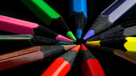colored pencils on black backgroundの写真素材