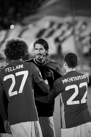 Greeting teams - Marouane Fellaini and Henrikh Mkhitaryan (MU), Match between the football club Rostov and the football club Manchester United in the city of Rostov-on-Don. 09.03.2017のeditorial素材