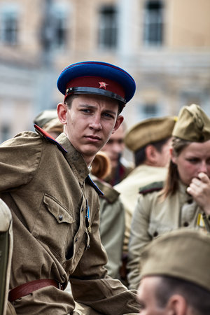 People in military uniform in honor of the Victory Day holiday. Military historical society, reconstruction of the appearance of fighters of the Second World War II. Rostov-on-Don. Russia 09.05.2018のeditorial素材