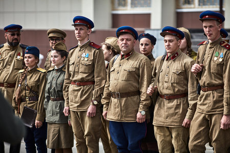 People in military uniform in honor of the Victory Day holiday. Military historical society, reconstruction of the appearance of fighters of the Second World War II. Rostov-on-Don. Russia 09.05.2018のeditorial素材