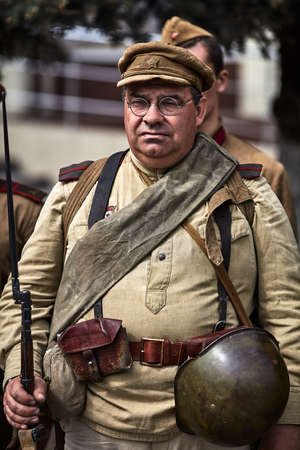 People in military uniform in honor of the Victory Day holiday. Military historical society, reconstruction of the appearance of fighters of the Second World War II. Rostov-on-Don. Russia 09.05.2018のeditorial素材