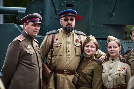 People in military uniform in honor of the Victory Day holiday. Military historical society, reconstruction of the appearance of fighters of the Second World War II. Rostov-on-Don. Russia 09.05.2018のeditorial素材