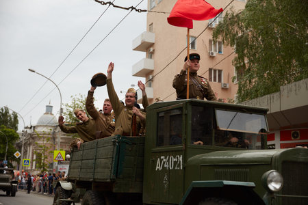People in military uniform in honor of the Victory Day holiday. Military historical society, reconstruction of the appearance of fighters of the Second World War II. Rostov-on-Don. Russia 09.05.2018のeditorial素材