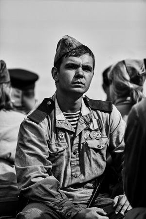 People in military uniform in honor of the Victory Day holiday. Military historical society, reconstruction of the appearance of fighters of the Second World War II. Rostov-on-Don. Russia 09.05.2018のeditorial素材