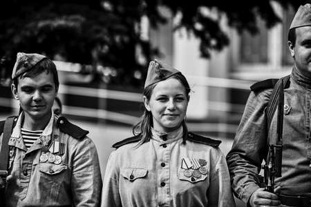 People in military uniform in honor of the Victory Day holiday. Military historical society, reconstruction of the appearance of fighters of the Second World War II. Rostov-on-Don. Russia 09.05.2018のeditorial素材