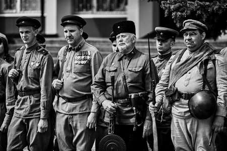 People in military uniform in honor of the Victory Day holiday. Military historical society, reconstruction of the appearance of fighters of the Second World War II. Rostov-on-Don. Russia 09.05.2018のeditorial素材