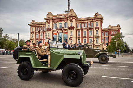 People in military uniform in honor of the Victory Day holiday. Military historical society, reconstruction of the appearance of fighters of the Second World War II. Rostov-on-Don. Russia 09.05.2018のeditorial素材