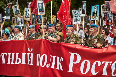 People in military uniform in honor of the Victory Day holiday. Military historical society, reconstruction of the appearance of fighters of the Second World War II. Rostov-on-Don. Russia 09.05.2018のeditorial素材