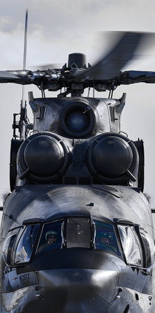 Focus on windows of cockpit and propeller of russian military helicopter Mi-26 T2, gray sky in background. Army air transport in Russia. Front view of chopper outdoors. 01.11.2017, Rostov Region, Russiaのeditorial素材