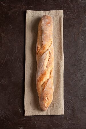 Freshly baked homemade baguette or bread with a crispy crustの写真素材