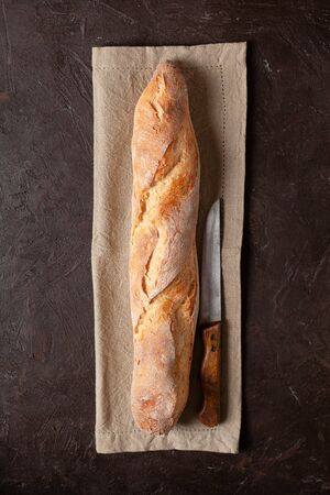 Freshly baked homemade baguette or bread with a crispy crustの写真素材