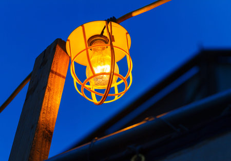 Old electric bulb hanging on cable in Las Vegas, Nevada, USA