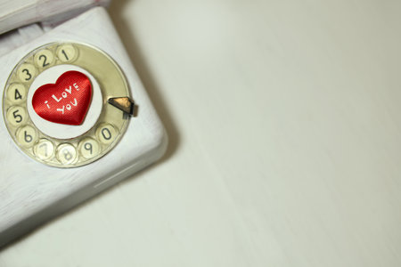 Valentines day february 14 holiday date old phone vintage copy space background white lettering love i love you postcard romantic congratulate your soul mate loverの写真素材