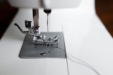 Sewing machine. Close-up of the hook and feet on the sewing machineの写真素材