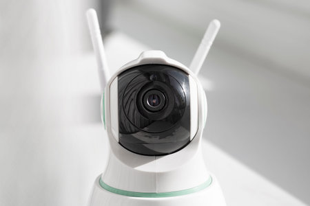 Close-up of a rotating head CCTV camera for a home. 360 degree rotation, object tracking. Home...