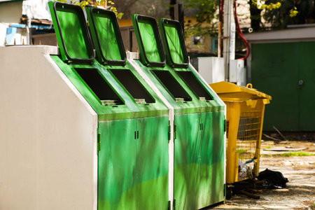 Waste management. Sorting garbage before dumping in the bin to save the world, caring for the environment. Pollution garbage disposal management concept.の写真素材