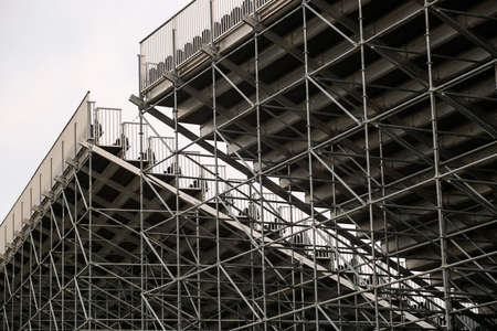 Empty white metal tribune for watching races, modern architecture, minimalismの写真素材