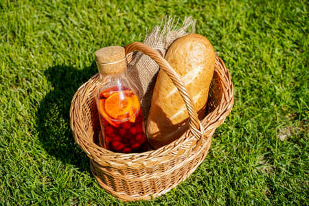 Healthy summer lemonade, citrus and berry cocktails, organic detox drink, antioxidant. Homemade refreshing drink in a bottleの写真素材
