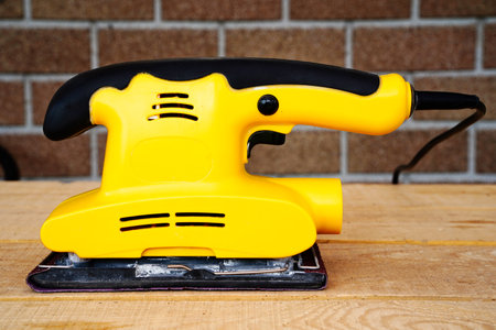 Vibrating flat grinding machine. Electrical Equipment Wood Surface Polishing Toolの写真素材