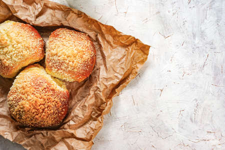 Homemade hot baked buns. Organic clean food, rustic traditional breakfast. Sweet pastries with sugar. Blank space for text, copy spaceの写真素材