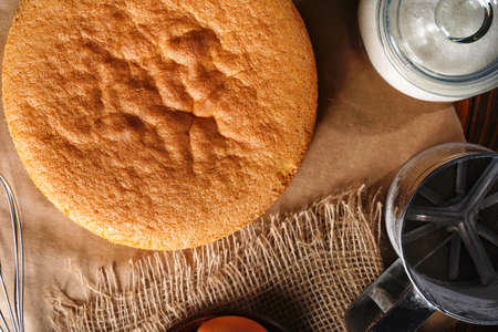 Preparing and baking a homemade sponge biscuit cake. Cooking homemade cake. Home confectionery.の写真素材