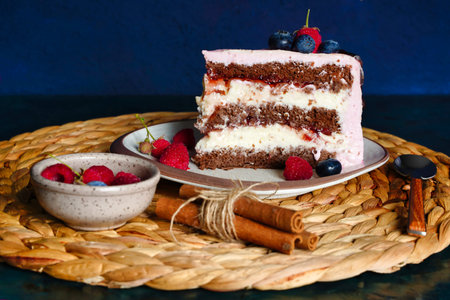 Piece of cake, chocolate sponge cake biscuit with cream cheese.