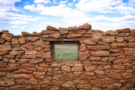 vintage wall with window wallpaper background blue sky with clouds