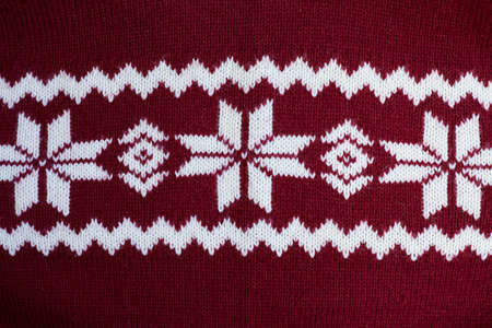 Texture of warm knitted motley clothes. Background knitted cozy winter clothesの写真素材