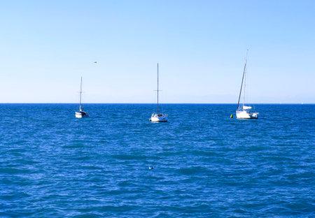 Three yachts in the sea