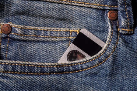 Credit cards in jeans pocketの写真素材