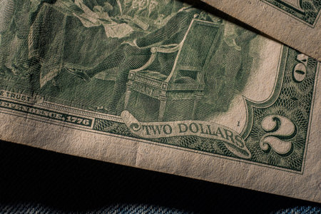 Closeup of the Declaration of independence drawing from the back of a two dollar bill.