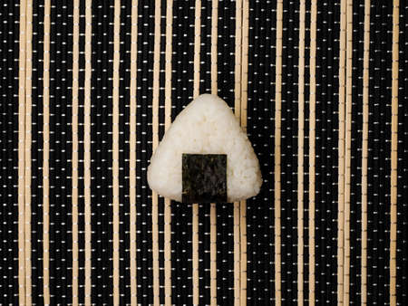 Single Onigiri. Healthy snack. Japanese rice ball. top view.の写真素材