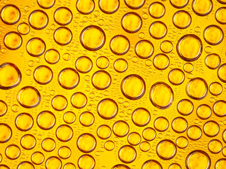 Colorful water drops on the light background. Abstract purple water bubbles wallpaper. Bright yellow...