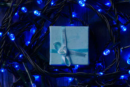 gift with blue garlandの写真素材