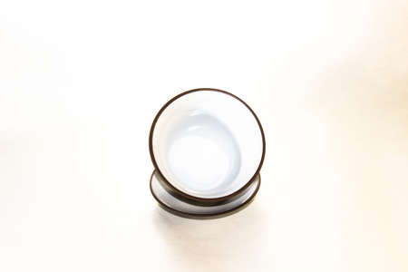 The Chinese ceramic gaiwan for holding a tea ceremony on a white background.の写真素材