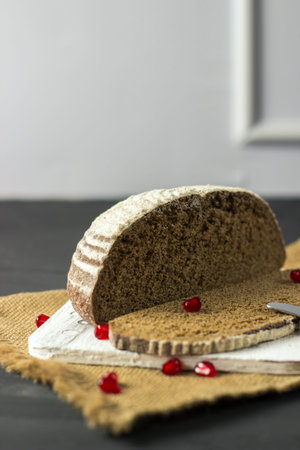 black rye bread with pomegranate seeds