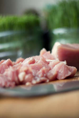 Slices of pork on a cutting boardの写真素材