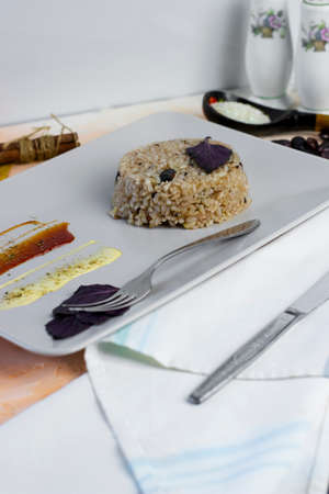Congri dish of Cuban national cuisine. Congri, Rice with beans, a typical dish of Cuban food. Simple but delicious dish of rice with fried beans and Congri, typical Cuban dishの写真素材